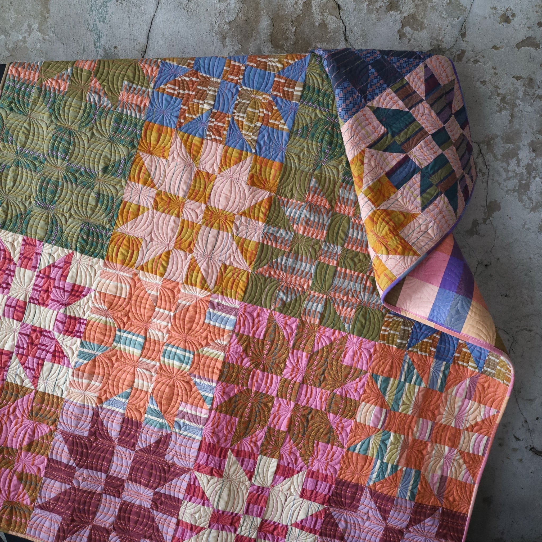 close up of Christmas Joy quilt sample with woven Lucky Loom fabrics