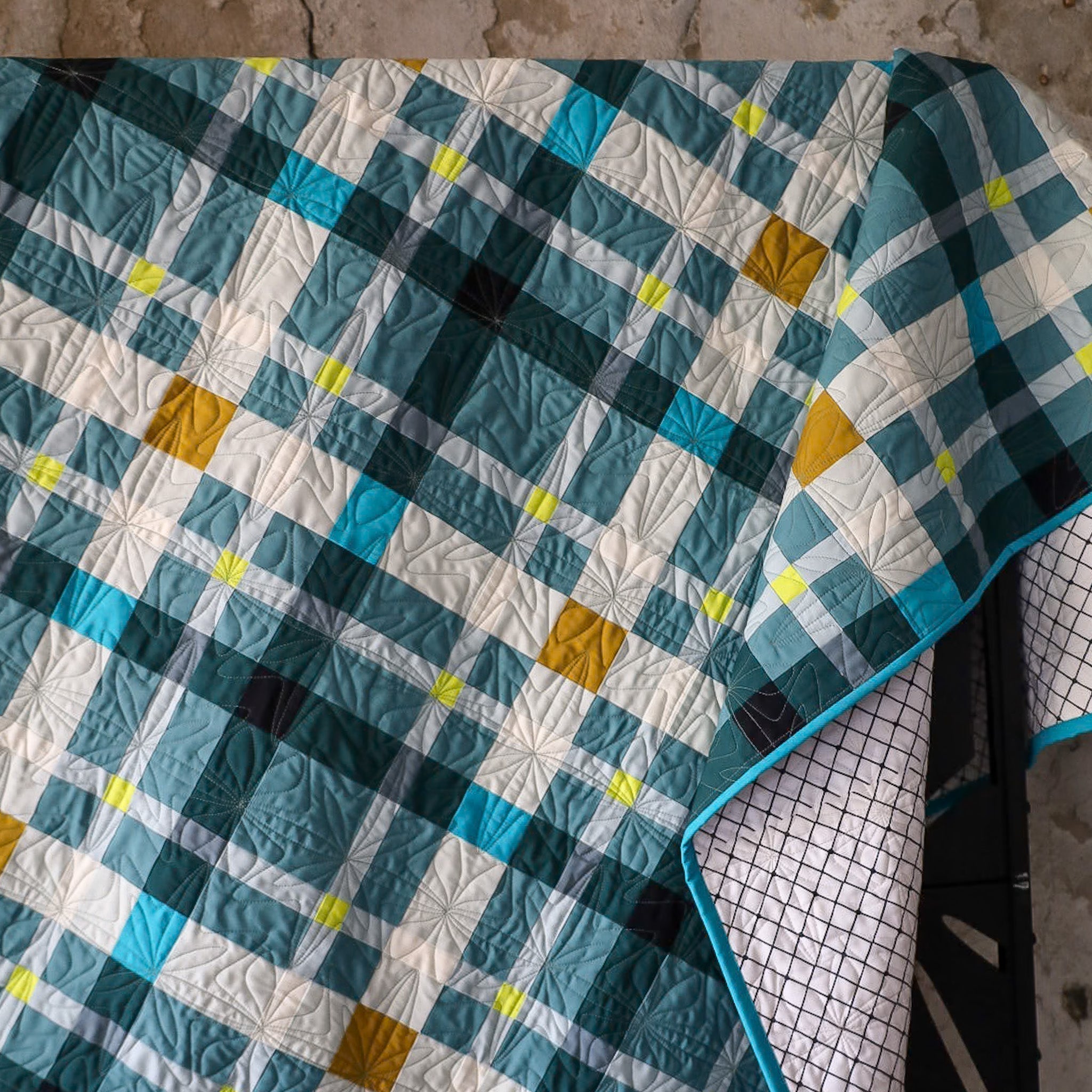 closeup of Wintergreen Petite Plaid quilt sample draped